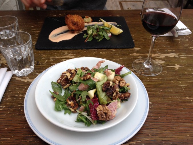 Lobster and crayfish potato cakes with bloody mary mayo, and shredded ham hock, rocket, pear, pomegranate and walnut salad