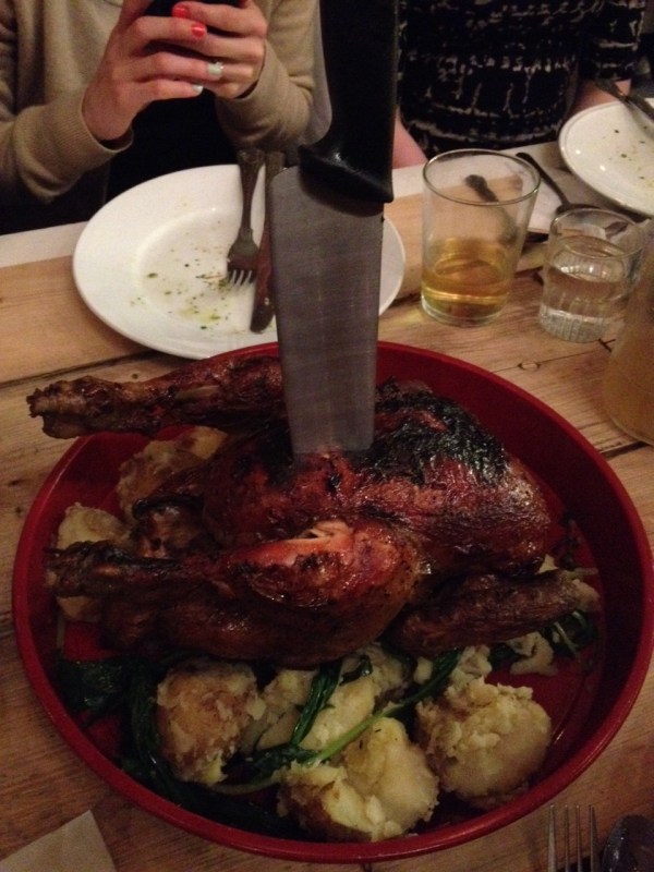 Serve yourself the chicken, with blackened potatoes and more greens